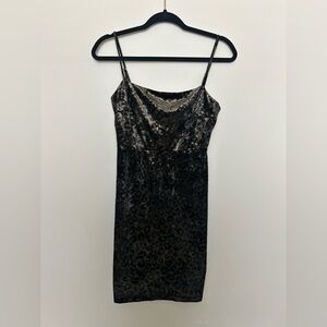 Shimmery black and gold leopard print mini dress